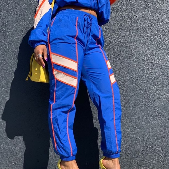 orange and blue track pants